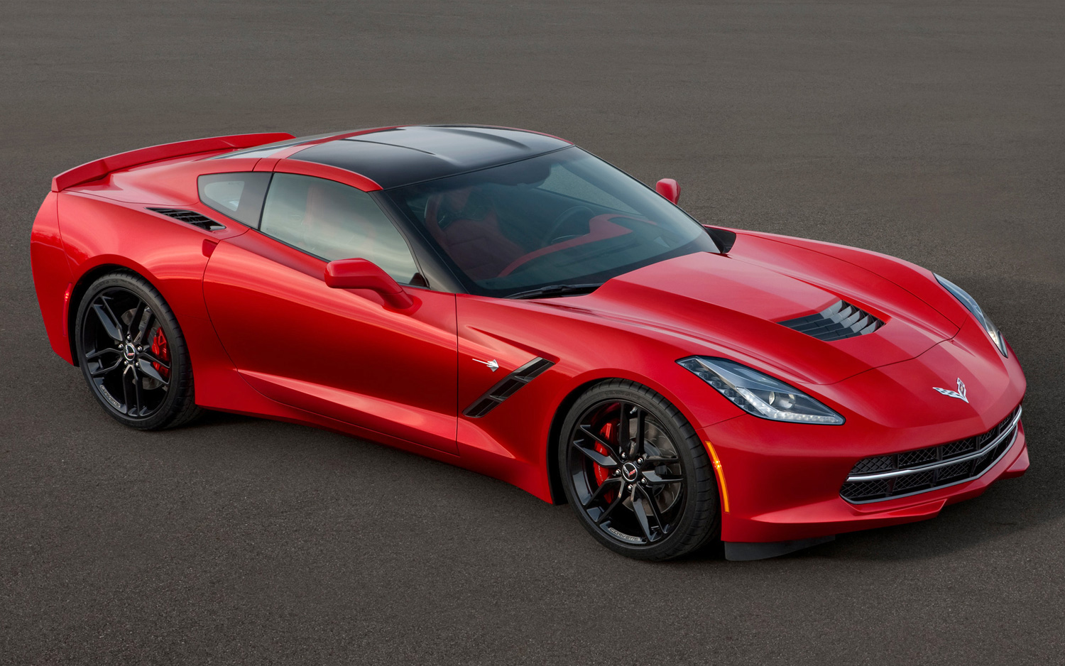 2014-chevrolet-corvette-stingray-in-red-front-three-quarter.jpg